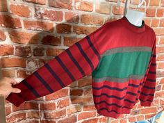 "amazing 80s 90s striped and colorblocked sweater. Shows minor signs of wear but no rips or stains. MEASURES - 25\" pit to pit and 27\" long TAGGED - L ~ BE SURE TO CHECK OUT MY ENTIRE SHOP ~ - This is a TRUE VINTAGE item! Vintage clothing sizing varies wildly ALWAYS use the measurements and info provided in the listing to assure proper fit! Unless the words \"deadstock\" or \"unworn\" are used please understand this is a USED item. RETURNS - My policy is NO RETURNS. If I made an error I will ma Retro Striped Color Block Sweater, Retro Striped Crew Neck Sweater, Indie Emo, Skater Boy, Color Block Sweatshirt, Striped Sweatshirts, Fall Weather, Pocket Tee, Printed Sweatshirts