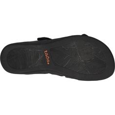 The Taos Double U is a casual women's leather slide sandal with two adjustable straps and pyramid stud hardware accents. These Taos Double U Black Leather Women's Sandals have the following features: Upper Material Leather Adjustable Strap Arch Support Premium microfiber Footbed Lining Forefoot Cushioning Hook and Loop Closure Insole Molded, Contoured Polyurethane and microfiber covered with Cool Recovery Foam Premium microfiber Lining Metatarsal Support Outsole Flexible, durable rubber Heel Hei Black Slip-on Sandals With Adjustable Strap, Black Leather Slides With Adjustable Strap, Adjustable Synthetic Slides With Single Toe Strap, Black Toe Loop Sandals With Arch Support, Leather Open Toe Slides With Studded Rubber Outsoles, Leather Slides With Adjustable Strap, Flat Shape, Black Leather Slide Sport Sandals, Leather Flat Sport Sandals With Arch Support, Black Synthetic Toe Loop Sandals