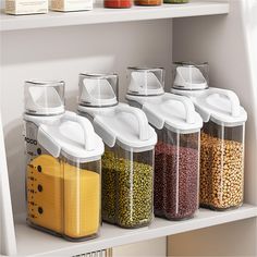 an organized pantry with food in containers and spices on the shelf next to each other