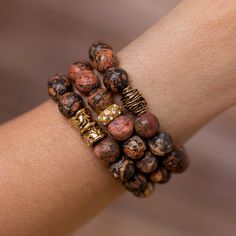 Add a touch of nature to any outfit with this unique stack of beaded bracelet designed and handmade in the South featuring semi-precious gemstones and gold accents. Each stack is carefully put together with perfect color combinations to accent the stones best features. Pair it with jeans and your favorite top for all day style. One size fits most. Stretches slightly for a comfortable fit. Handmade in Jacksonville, Florida Each of our designs are hand crafted and may vary slightly. Brown Agate Bracelet, Bronze Bracelet, Bronze Bracelets, Brown Agate, Jewelry Making Earrings, Leopard Skin, Brown Bracelet, Jacksonville Florida, Gemstone Beaded Bracelets