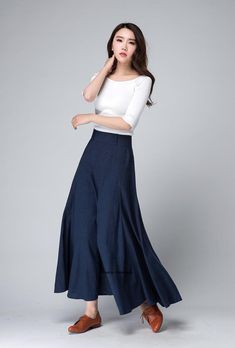 "'70s-inspired dark blue skirt from Xiaolizi. The maxi skirt in a high-rise construction with a slim-cut, the elegant skirt flowing fit all the way down to the ankle. The high waisted skirt topped with a banded waist. The A line skirt finished with pleating details. DETAIL * Soft linen cotton blend * 50% Linen , 50% Cotton * Summer maxi skirt * Side zipper in the right side * Has no pockets * Ankle length * More colors select from the picture NO. 4 https://etsy.me/3fOKWlH * The model is 168 cm ( Relaxed Maxi Skirt With Pleated Wide Hem, Fitted Maxi Skirt With Lined Wide Hem, Fitted Maxi Skirt With Wide Hem And Lining, Wide Hem Fitted Lined Skirt, Fitted Wide Hem Lined Skirt, Fitted Skirt With Lined Wide Hem, Fitted Skirt With Wide Hem And Lining, Fitted Blue A-line Maxi Skirt, Blue Relaxed A-line Maxi Skirt