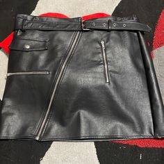 Leather Zipper Skirt From Fashion Nova, Size 2x, Never Been Worn Still Has Tag. Edgy Black Skirt With Zip Fly, Punk Style Skirt With Zipper For Night Out, Black Skirt With Zip Fly For Fall, Punk Style Black Mini Skirt With Zipper, Punk Style Black Mini Skirt With Zipper Closure, Black Skirt With Zip Fly For Night Out, Black Punk Mini Skirt With Zipper Closure, Black Punk Skirt With Zipper Closure, Black Mini Skirt With Zip Fly For Night Out