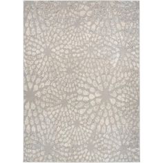 a white rug with an intricate design on the top and bottom part of it's surface