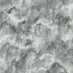 an abstract grey and white painting with black spots