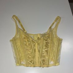 Victoria Secret Bustier Lingerie Corset Top Marked Small New With Tags Yellow Hook Eye Shop Policies Must Be Read Before Purchasing! By Purchasing You Have Agreed To These Terms On My Page Or Linked Here Https://Depop.App.Link/Ppojjjf2cdb #Bustier #Vs #Victoriasecret #Lace #Corset Underbust Bra With Boned Bodice, Fitted Underbust Bra With Boned Bodice, Party Camisole Corset With Lace Trim, Camisole Corset With Lace Trim For Parties, Coquette Fitted Lace Bra, Fitted Lace Bra In Coquette Style, Fitted Lace Coquette Bra, Coquette Lace Corset With Underwire, Underwire Party Corset With Bra-friendly Design