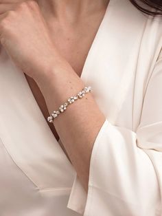 DESCRIPTION A luxe bracelet adorned with pearls and crystals. Complete your look with effortless sophistication, and don't be afraid to layer with other delicate bracelets. Also available in soft white gems: *Special Edition* Nigella Bracelet Get the perfect length: Chain Extender. Wear with: Blair Drops or Zoe Hair Pi Classic Pearl Jewelry, Bride Bracelet, Wedding Accessories Jewelry, Wedding Jewelry Bracelets, Bridesmaid Bracelet, Chain Extenders, Don't Be Afraid, Stone Gold, Gold Jewellery Design