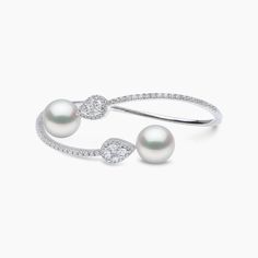 Each piece in our Starlight collection features, delicate alluring diamond patterns, reminiscent of the constellations that light up the night sky. This 18K white gold bangle features lustrous 12-13mm Australian South Sea pearls, set amidst a mesmeric diamond design. This intricate bangle will elevate any outfit. Pearl Size: 12 - 13mmMetal: 18K White GoldApproximate Diamond Weight: 1.66ct Rare Pearls, The Constellations, White Gold Bangle, Pearl Jewellery, Yoko London, Sea Pearl, Gold Bangle, Diamond Bangle, South Sea Pearls