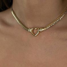 Understated elegance abounds with this Beverly Heart Necklace. Crafted with titanium steel; this necklace provides maximized durability, is lightweight, comfortable to wear, and does not tarnish. Now available in gold and silver. Unique Pearl Necklace, Pink Heart Necklace, Gold Chain Choker, Heart Shaped Pendant Necklace, Heart Shaped Necklace, Heart Choker, Gold Heart Necklace, Silver Heart Necklace, Summer Necklace