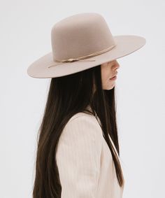 Rue is a sophisticated, classic open crown shape with a structured semi-wide brim. This is the only hat featuring hand-stitched detailing on the brim's edge for a subtle, distinctive touch. Included is a tonal triple-strand waxed leather band that is both adjustable + removable for styling. Halo Style, Wearing A Hat, Leather Hats, Find Color, Felt Hat, Hat Band, Fedora Hat, Fashion Pictures, Wide Brimmed