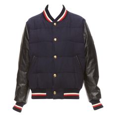 MONCLER GAMME BLEU navy wool leather sleeves goose down bomber jacket Sz2 M Reference: CNPG/A00071 Brand: Moncler Designer: Thom Browne Collection: Gamme Bleu Material: Wool, Leather Color: Black, Navy Pattern: Solid Closure: Snap Buttons Lining: Multicolour Fabric Extra Details: Styled with Thom Browne's signature preppy aesthetic, the Quilted Varsity Jacket epitomises the acclaimed designer‚Äôs approach to outerwear. Block colours fuse effortlessly in a classic varsity silhouette with supremel Mens Blue Jacket, Mens Padded Jacket, Blue Jacket Men, Moncler Women, Leather Sleeves, Preppy Aesthetic, Men's Outerwear, Leather Sleeve, Padded Jacket