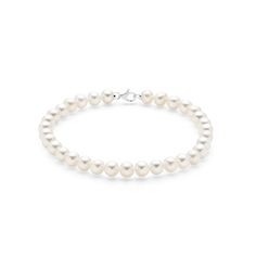 Discover the classic beauty of this elegant freshwater pearl bracelet, adorned with 5mm natural pearls and an 18K white gold lobster clasp. The slightly larger pearls offer a more pronounced statement while maintaining a timeless look that suits any style. Whether worn alone or stacked with other bracelets, this piece enhances your ensemble with its graceful charm. The high-quality white gold clasp ensures durability and security, making it a perfect choice for everyday wear or special occasions Timeless Silver Pearl Bracelet For Formal Occasions, Classic White Gold Pearl Bracelet With Oyster Clasp, Classic White Gold Pearl Bracelet With Oyster Details, Timeless White Gold Pearl Bracelet For Anniversary, Timeless White Gold Pearl Bracelet, Luxury Akoya Pearl Bracelet For Formal Occasions, Single Strand Akoya Pearl Bracelet In Pearl White, Akoya Pearl Charm Bracelet With Round Beads, Akoya Pearl Bracelet With Round Beads And Pearl Charm