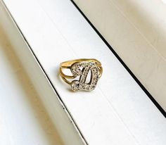 A Vintage Retro 14k Gold Letter Initial "D" Ring Set with Diamonds All items are XRay and Acid tested to ensure metal authenticity. All pieces in this store are solid gold in the purity listed unless otherwise stated.  Weight: 3.3 grams Size: 6.25 (resizing available upon request) Initial D, Rings Vintage, Gold Letter, Initial Ring, Gold Initial, Gold Letters, X Ray, D Ring, Rings Statement