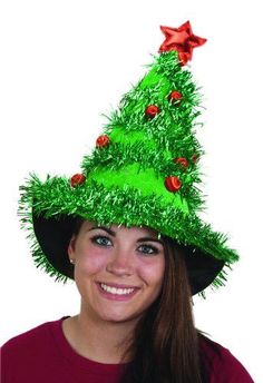 These Christmas Tree Hats are perfect for holiday parties, corporate events, office parties, community events, family parties, Christmas in July, elves, parades or breakfast with Santa. Decorated with green tinsel garland, lame ornaments and red star on the top of a hat. Hat is made of felt. Sold individually. Other Christmas costumes and accessories are sold separately on our page – subject to availability. One size fits most larger children, teens and adults. One size fits most larger children Christmas Costumes For Adults, Funny Christmas Hats, Light Up Hats, Christmas Tree Costume, Tree Hat, Tree Costume, Green Tinsel, Christmas Tree Hat, Tacky Christmas