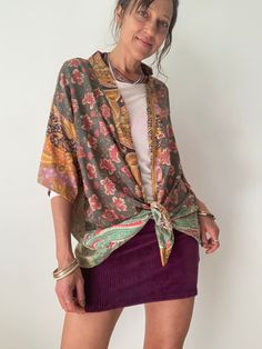 This is colorful patchwork kimono blouse, Unisex style, made for men and ladies Fabric is lightweight vintage saree silk perfect for holidays summer parties and festivals  oversized | free size  more available at  https://www.etsy.com/shop/AltheaStores?ref=seller-platform-mcnav Thank You for looking Casual Multicolor Patchwork Kimono, Casual Multicolor Tunic Kimono, Vintage Patchwork Kimono For Festivals, Green Bohemian Short Sleeve Kimono, Multicolor Short Sleeve Kimono For Festivals, Short Sleeve Multicolor Kimono For Festival, Oversized Bohemian Patchwork Tops, Festival Multicolor Short Sleeve Kimono, Bohemian Short Sleeve Kimono One Size