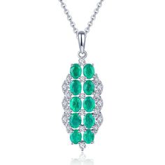 Introducing our Sterling Silver Line Necklace--an exquisite piece that beautifully showcases the timeless allure of emeralds. This Green Gemstones Bar Necklace features a Double Halo Bar Pendant, a stunning arrangement of May Birthstone Emeralds totaling 1.67 carats. The emeralds, in oval cut, form two elegant lines with a total of 10 gemstones. Adding a touch of brilliance is the sparkle of 0.268 carats of White Zircon. Crafted with precision, the pendant gracefully slides along a Silver Chain, Gemstones Pendant, Gemstone Bar Necklace, Jewelry Design Drawing, Green Hues, Silver Line, Bar Pendant, Design Drawing, Green Gemstones, Emerald Gemstone