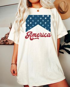 America Shirt. Printed on Comfort Colors Tee. Must size up for oversized look. See size chart for measurements. Comfort Colors® 1717 Medium fabric (6.1 oz/yd² (206.8 g/m²)) Relaxed fit Sewn-in twill label 100% ring-spun cotton Gildan is back with its garment-dyed t-shirt, a fully customizable tee made 100% with ring-spun cotton. Care instructions Machine wash: cold (max 30C or 90F); Do not bleach; Tumble dry: low heat; Iron, steam or dry: low heat; Do not dry clean. ★SHIPPING TIMES All of our de Relaxed Fit Letter Print Tops For 4th Of July, Summer Relaxed Fit Shirt With Logo Print, Oversized Cotton Top With Letter Print, Oversized Cotton Top With Text Print, 4th Of July Cotton T-shirt With Text Print, Graphic Cotton Tee For 4th Of July, Casual Cotton Tops For 4th Of July, Cotton Graphic Tee For 4th Of July, Casual Relaxed Fit Shirt For 4th Of July