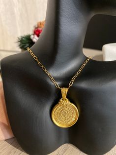 Buy an original Greek Pendant Gold Plated Phaistos Disk | Discover Greek Jewelry within a huge collection of Ancient Greek Jewelry | shipping worldwide           This amazing piece of jewelry is representing the Ancient Greek Symbol so called Festos disc. Made of a mixing of silver 925 and 24k gold full filled plated.An excellent gift for women and also for men that would love to wear a geometric symbol. Size The diameter of the big disc is 3 cm approximately   The thickness is 1,2mm The diameter of the small disc is 2 cm approximately   The thickness is 1,2mm   PRICE IS WITH CHAIN Please inform me which chain you prefer with your order.  The length of the big paper link chain necklace is 41 cm (13inches). The chain is made of a mixing stainless steel and 24k gold filled.  The length of th Spiritual Brass Coin Necklace With Round Pendant, Brass Amulet Style Coin Necklace, Brass Amulet Coin Necklace, Amulet Style Coin Necklace With Adjustable Chain, Amulet Style Medallion Necklace With Adjustable Chain, Spiritual Gold-plated Medallion Necklace With Round Pendant, Brass Coin Necklace With Round Pendant, Spiritual Gold Plated Round Medallion Necklace, Amulet Style Adjustable Chain Necklace With Round Pendant