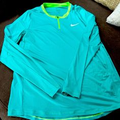 This Is A Great Sporty, Long Sleeve Nike Three-Quarter Zip. It’s Brand New Never Been Worn Very Lightweight. You Can Wear This Almost Anywhere. It’s A Great Looking Shirt Green Sporty Long Sleeve Top, Sporty Yellow Long Sleeve Top, Sporty Long Sleeve Yellow Top, Yellow Long Sleeve Sporty Top, Green Stretch Long Sleeve Shirt, Nike Green Long Sleeve Tops, Nike Long Sleeve Shirt, Nike Long Sleeve, Nike Green