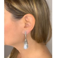 Delivery in 3-5 business days Need it faster? Text us at (619) 247.5731 or Call us at (619) 365.4736 ﻿This pair of earrings are perfect for Diamonds & Barroque Pearl, this design gives the piece an elegant touch. Diamond: 2.14 ct Pearl Barroque: 60.38 Silver with Rhodium Plated weight: 8.28 grams Gold Post Luxury Sterling Silver Pear-shaped Earrings, Luxury Pear-shaped Sterling Silver Earrings, Luxury Pierced Chandelier Earrings For Formal Events, Fine Jewelry Bridal Earrings For Formal Occasions, Elegant White Gold Pear-shaped Chandelier Earrings, Luxury Long Drop Pearl Earrings, White Gold Drop Chandelier Earrings For Evening, White Gold Chandelier Earrings For Formal Occasions, Formal Bridal Fine Jewelry Earrings