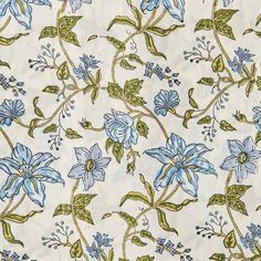 blue flowers and green leaves on white fabric