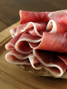 raw meats are stacked on top of each other