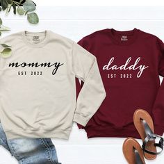 Mommy Daddy Est Custom Sweatshirt, Mama Dad Couple Sweatshirt, Family Matching Hoodie, Personalized Est Dad Mom Long Sleeve, Mommy Daddy Tee. Welcome to our store! -We specialize in funny, customizable apparel shirts in different colors and styles printed on ultra-soft, super comfortable, and breathable material. -Solid colors 50/50 Preshrunk Cotton/Polyester -We use Gildan - Heavy Blend and one of the best quality products on the market. If there are personal designs you want, we can make custo Winter Long Sleeve Sweatshirt With Name Print, Family Matching Long Sleeve Hoodie With Letter Print, Family Matching Long Sleeve Sweatshirt With Name Print, Winter Name Print Relaxed Fit Sweatshirt, Winter Sweatshirt With Name Print In Relaxed Fit, Hoodie Personalized, Half Birthday, Couples Sweatshirts, Custom Sweatshirts