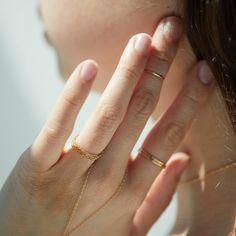 Glinting and gossamer - as fine as can be. Prone to glimmering, extremely talented at catching the light. Our new favorite. Works beautifully on its own - we particularly love it as an index finger ring, but don't let us hold you back. Have your way - whisper your own Sweet Nothing. Delicate Round Promise Jewelry, Delicate Round Jewelry For Promise, Everyday Diamond Cut Open Ring Jewelry, Everyday Open Ring Diamond Cut Jewelry, Timeless Chain Ring As Gift, Gold Hypoallergenic Midi Rings For Promise, Fine Hypoallergenic Jewelry For Promise Ring, Hypoallergenic Fine Jewelry Open Ring, Minimalist Promise Jewelry