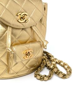 CHANEL Pre-Owned 1992 Duma diamond-quilted Backpack - Farfetch Luxury Gold Quilted Bag, Luxury Quilted Gold Bag, Gold Quilted Travel Bag, Luxury Quilted Backpack For Travel, Designer Quilted Gold Bags, Luxury Quilted Travel Backpack, Gold Luxury Backpack, Gold Leather Travel Backpack, Gold Leather Backpack