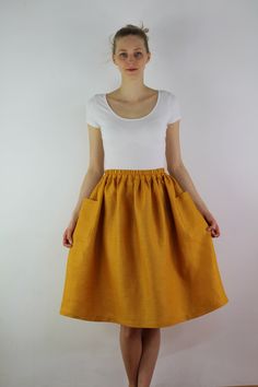 "Write the selected color in the message Handmade mustard linen midi skirt with зatch pockets on the sides, elastic waistband, perfect for casual wear and suitable for any occasion in any season Details: - 100% natural linen produced in Europe ; - medium weight (180 gram per square meter); - color: mustard, could be any from our colors catalog (color samples at the photo); Made to order, approximately a few days, If you have any questions please message me and I will be glad to answer. Size guid Mustard Skirt, Linen Midi Skirt, Maxi Skirts Summer, Color Catalog, Linen Dress Women, Pretty Skirts, Skirt Casual, Skirt With Buttons, Summer Linen Dresses