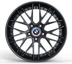 a black wheel on a white background with the word bmw written in blue and red