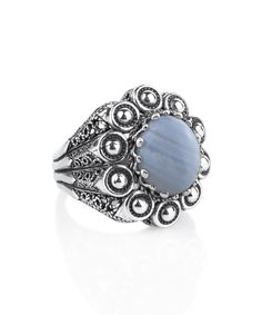 Looking for a unique and exquisite ring for a special occasion? Check out our handmade Blue Lace Agate Embroidery Ring. Crafted from the finest materials, this 925 sterling silver ring features intricate filigree art and an oxidized antique finish. The ring showcases a 10x12 mm cabochon oval cut Blue Lace Agate gemstone in a bezel setting. With a ring face length of 0.9 inches / 22.50 mm and width of 0.80 inches / 20.00 mm, this piece is sure to turn heads. It comes with a velvet pouch, silver p Blue Oval Agate Jewelry, Oval Blue Agate Jewelry, Elegant Silver Chalcedony Rings, Handmade Blue Agate Rings, Elegant Blue Ring With Natural Stones, Blue Chalcedony Round Jewelry, Blue Chalcedony Cabochon Rings, Blue Agate Cabochon Jewelry, Elegant Agate Ring With Natural Stones