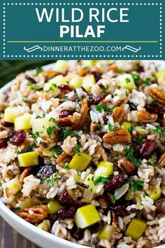 wild rice pilaf with apples, cranberries and pecans in a white bowl