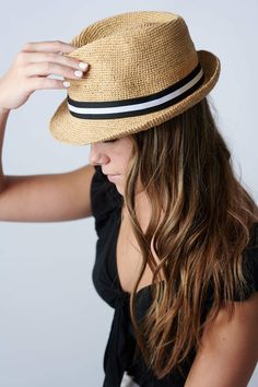 Sunny days are better with The Essential Hat. This crochet straw fedora hat is made of natural materials and is finished with a black & white band. It’s a must have! The Essential Hat is packable. Roll it up and reshape it. Light weight and very comfortable on the head. Content:- Raffia Straw- Imported Size:- One Size Fits All, Adjustable- Crown: 4.4"- Brim: 1.5" Straw Fedora Hat, Straw Fedora, White Band, Fedora Hat, The Head, Straw Hat, Natural Materials, Panama Hat, Sunny Days