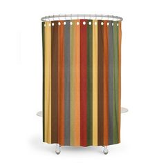 a shower curtain with multicolored stripes on it