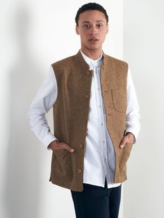 We never mess with our classics. One of our most popular designs, this Nehru Waistcoat is made from Shetland wool with a beautiful fawn herringbone finish. Made with a regular fit, it is lined with cotton for a comfortable feel all around. It makes for the perfect piece for a weekend in the countryside, finding home nicely both in nature and at the local pub alike. Sleeveless and Mandarin-collared, we've finished it with three large patch pockets, internal jet pockets and characterful coconut bu Shetland Wool, Candle Light Dinner, Popular Designs, Boxer Shorts, Mandarin Collar, In Nature, Online Purchase, Herringbone