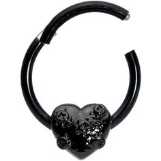 a black heart shaped ring with skulls hanging from it's side on a white background