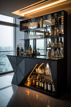 a bar with lots of bottles and glasses on the shelves in front of a large window