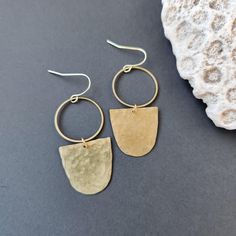 Hammered Brass Dangle Earrings 14k plated brass, hypoallergenic and nickel free ear hooks These dainty brass earrings measure 2 inches long Brass has been sealed to prevent tarnish Earrings come with clear backs and muslin bags Earrings Dangle Simple, Dangle Earrings Boho, Muslin Bags, Hammered Brass, Earrings Simple, Ear Hook, Etsy Earrings Dangle, Earrings Boho, Brass Earrings