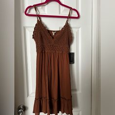 Please Check Out My Store. I Also Have It In A Mustard Yellow Color. Adjustable Spaghetti Strap, Crochet, Top, Ruffle Bottom & Smocked Up Back. Length From Center Back 27” Across Chest All Around 33” Brown V-neck Summer Sundress, Casual Brown V-neck Mini Dress, Bohemian Brown Dress With Spaghetti Straps, Sleeveless Brown Mini Dress For Brunch, Brown V-neck Mini Dress For Day Out, Sleeveless Brown Mini Dress For Day Out, V-neck Brown Mini Dress For Day Out, Brown Spaghetti Strap Dress For Spring, Brown Sleeveless Mini Dress For Day Out