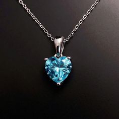 Solid Sterling Silver Blue Topaz December birthstone love heart pendant, with strong Sterling Silver chain. This December Birthstone necklace is the perfect birthday or Christmas gift. Matching earrings available here: https://www.etsy.com/listing/1352816205/ Available to order in gold, white gold, rose gold or platinum, please contact me for prices.  💎Pendant thickness: 6mm 💎Pendant width: 9mm 💎Pendant overall Length: 17mm 💎Chain length: 18 inch or other length if required.  ✨ For free give Gift Heart Cut Gemstone Birthstone Necklace, Heart Cut Gemstone Birthstone Necklace Gift, Heart Cut Birthstone Necklace As A Gift, Heart Pendant Necklace With Birthstone For Birthday, Heart Cut Gemstone Necklace For Mom, Sapphire Heart Pendant Jewelry As Gift, Sapphire Heart Necklaces For Anniversary, Sapphire Heart Necklace For Anniversary, Heart-shaped Sapphire Necklace For Anniversary