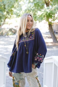 All of your boho dreams have come true with the Quinnlan Embroidered Tunic. You're going to love pairing this with all of your favorite bottoms! Lightweight Cotton gauze fabric Relaxed, loose and flowy silhouette with slight high-low bottom edge (perfect for your leggings!) Flattering round neckline and dropped shoulders and ruched center front panel Loose and long Dolman sleeves with elastic cinched cuffs So pretty floral embroidery details throughout for added boho style Pair with: Eye Of The Bohemian Embroidered Top With Boho Collar For Spring, Spring Bohemian Embroidered Top, Bohemian Embroidered Relaxed Fit Blouse, Bohemian Rayon Top With Floral Embroidery, Bohemian Embroidered Peasant Top For Spring, Bohemian Embroidered Peasant Top For Fall, Bohemian Rayon Tops With Floral Embroidery, Bohemian Peasant Top With Multicolor Embroidery, Bohemian Embroidered Top For Spring Festival