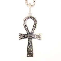 Description: This stunning Ankh pendant is made of high-quality 18K white gold and features a combination of round diamonds with H color. The total weight of the pendant is 61g, and it comes with a 28in 14K white gold chain. The Ankh symbolizes the key to life and is believed to provide good fortune and protection to those who wear it. The pendant's exquisite craftsmanship and the brilliant diamonds make it an excellent addition to any jewelry collection. The item code for this 18K white gold An White Gold Necklace With Large Cross Pendant, White Gold Large Cross Pendant Jewelry, Spiritual White Gold Jewelry With Large Pendant, Luxury Silver Necklace For Ceremonial Occasions, Symbolic Formal Necklace With Large Pendant, Formal Symbolic Necklace With Large Pendant, White Gold Cross Necklace With Large Pendant, Symbolic Necklace With Large Pendant For Formal Occasions, Luxury White Gold Necklace For Ceremonial Occasions