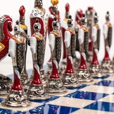 a chess board with many different types of figurines on it's sides