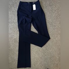 Navy Blue Express Flared, Dress Pants. Size 2 Long. Great Condition. Never Worn. Tag Still Attached. Fitted Navy Straight Dress Pants, Navy Fitted Elastane Pants, Fitted Full-length Navy Dress Pants, Elegant Stretch Navy Pants, Navy Fitted Bottoms For Office, Navy Fitted Dress Pants For Work, Chic Navy Fitted Pants, Chic Fitted Navy Pants, Chic Fitted Navy Bottoms