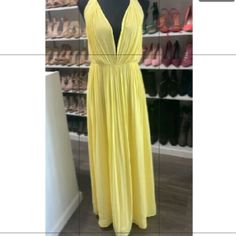 Look Like A Goddess In This Chiffon Dress. Yellow Halter Dress New With Tags Long Open Back Zipper Closure On Back Armpit To Armpit: 19" Total Length: 60" (From Top To Bottom Hem) Size: Large (Non Stretchy) Self: 100% Polyester Lining: 100% Polyester Lined V-neck Sundress For Date Night, Summer Pleated V-neck Dress, Summer Flowy Maxi Dress For Party, Summer Party Maxi Dress Flowy Style, Spring Party Sundress Maxi Length, Summer Party Flowy Maxi Dress, Spring Party Maxi Sundress, Pleated Sundress Maxi Dress For Party, Party Pleated Sundress Maxi Dress