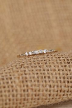 14k Gold Diamond Ring / Baguette and Round Diamonds / Solid Gold Band / Minimalist Engagement Ring / Dainty Gold Ring / Yellow✔ Handmade✔ Solid Gold✔ Natural Diamonds✔ The width of the Band is 1.9mm on top - 1.30mm at the bottom✔ Height is 2mm✔ Ct weight: 0.32ctw for size 9 Small Gold Necklace, Engagement Ring Dainty, Dainty Gold Ring, Ring Baguette, Minimalist Engagement Ring, Dainty Gold Rings, Solid Gold Band, Cluster Necklace, Gold Diamond Ring