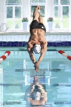 a woman diving into a swimming pool