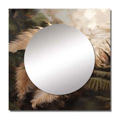 a round mirror sitting on top of a wall