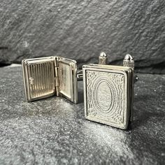 Unlock the door to elegance and individuality with our Secret Book Cufflink Set in 14k White Gold Plating. These unique men's cufflinks are more than just accessories; they're a blend of sophistication and personalization that will elevate any attire. Crafted with meticulous attention to detail, these openable photo cufflinks are perfect for those seeking cool men's cufflink gifts that stand out. They are a great gift for your husband , father or the perfect groomsmen gifts. its a  Key Features: Elegant Rectangular Cufflinks For Father's Day, Silver Screw Back Cufflinks For Anniversary, Luxury Rectangular Cufflinks For Wedding, Classic Rectangular Cufflinks For Father's Day, Classic Wedding Cufflinks With Gift Box, Silver Screw Back Cufflinks For Wedding, Engraved Rectangular Cufflinks For Formal Occasions, Engraved Rectangular Cufflinks For Formal Wear, Classic Rectangular Cufflinks For Gift