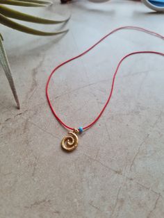 🌙 Handcrafted 14k gold plated dainty adjustable red string necklace 🌙 All materials used are tarnish free and durable 🌙 Best gift for your friends and family or just for yourself 🌙 Regular shipping takes approximately 10-15 business days depending on your country. Express shipping takes 3-5 business days. Please choose express shipping if you want to receive your package faster 🌙 I do offer combined shipping. Please feel free to contact me for custom orders and combined shipping orders 🌙 Although my products are durable and tarnish free, you better keep them away from excessive water and chemicals, perfumes etc. 🌙 For more jewelries don't forget to check my store: https://www.etsy.com/shop/MiniMoonDesign Handmade Adjustable Yellow Gold Charm Necklaces, Spiral Adjustable Necklace As Gift, Adjustable Spiral Necklace As Gift, Adjustable Spiral Necklace For Gifts, Adjustable Spiral Necklace For Gift, Adjustable Charm Necklaces With Tiny Beads As Gift, Adjustable Tiny Beads Charm Necklace As Gift, Red Spiral Jewelry As Gift, Red Spiral Jewelry For Gifts